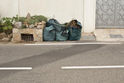 Waste collection truck in Yeading neighborhood